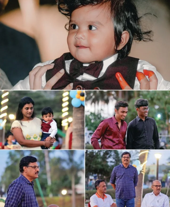 Smiling birthday child with cake and balloons