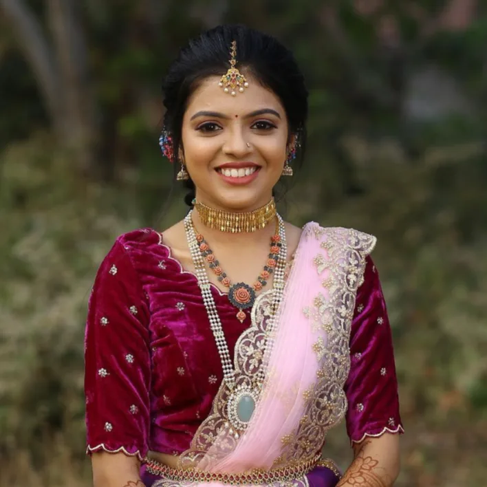 Radiant bride in traditional wedding attire, captured by RJ Photography